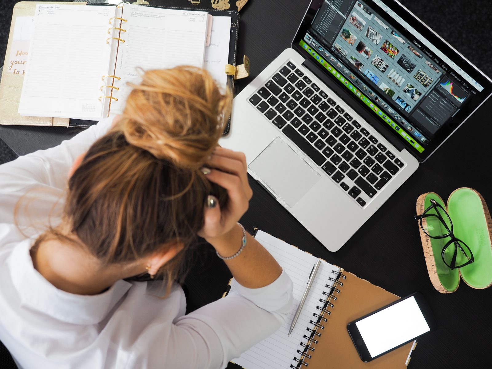 Woman frustrated with excess work pressure